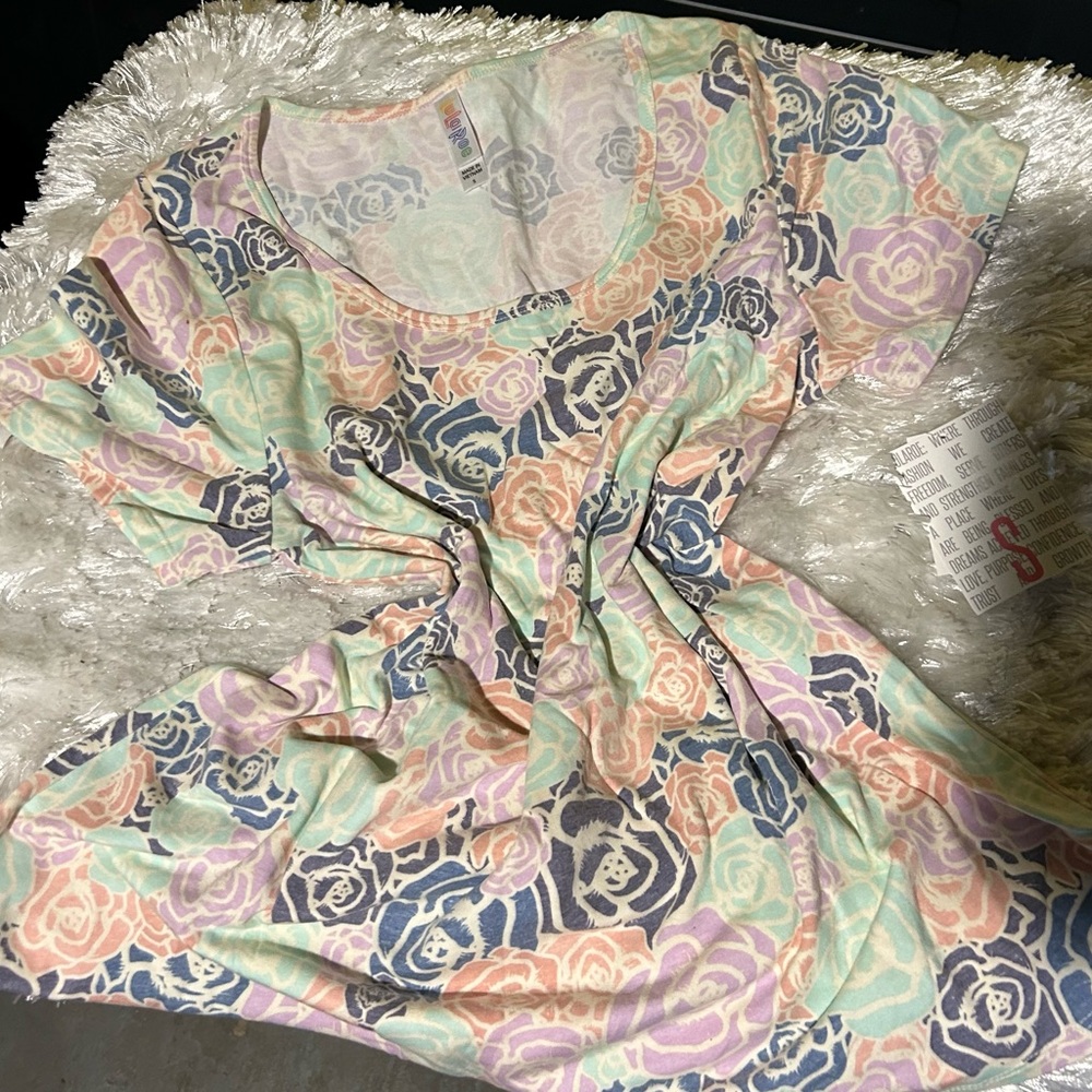 Beautiful LuLaRoe Classic Tee with roses on it.  Size Small.  Stretchy!